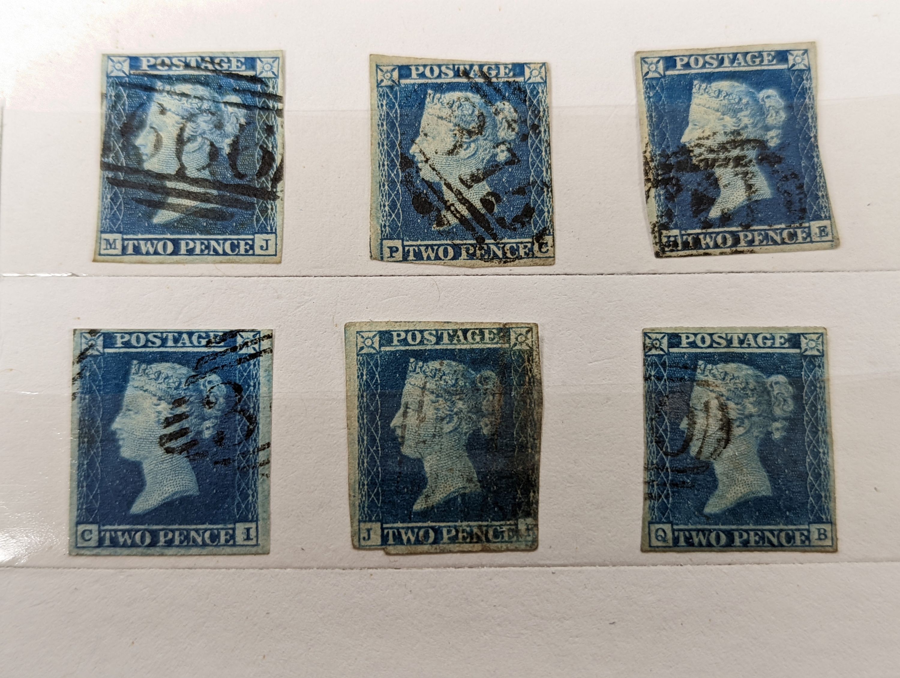 Great Britain - small stock book 2d blues with 1841 2d used strip of three, 6 singles used. 1858 2d plate 13 and plate 14 mint blocks of four